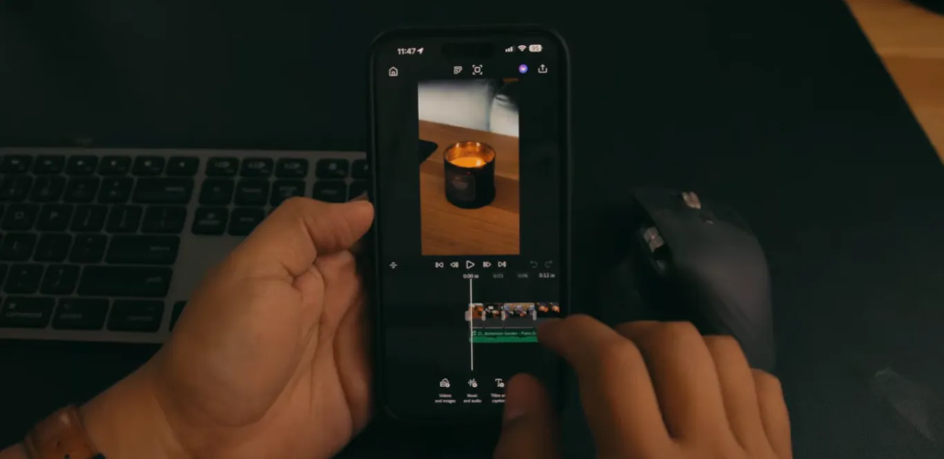 Premiere Pro Mobile timeline trimming B-roll of a candle on iPhone—editing clips and managing video, music, titles and captions for Reels/TikTok.
